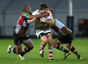 26 August 2011; Conor Gaston, Ulster, is tackled by Jordan Turner-Hall, left, and Ross Chisholm, Harlequins. Pre-Season Friendly, Ulster v Harlequins, Ravenhill Park, Belfast, Co. Antrim. Picture credit: John Dickson / SPORTSFILE