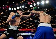 17 March 2017; Alex Saucedo, left, in action against Johnny Garcia in their super lightweight bout at The Theater in Madison Square Garden in New York, USA. Photo by Ramsey Cardy/Sportsfile