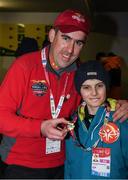 18 March 2017; Sergeant Paul McGee, Milford Garda Station, Co Donegal who was a member of the Law Enforcement Final Leg Torch Run and ran around Austria over the last ten days presents a Final Leg pin to Team Ireland's Caolan McConville, a member of Skiability Special Olympics Club, from Aghagallon, Co. Armagh ahead of the Opening Ceremony of the 2017 Special Olympics World Winter Games at Planai-Hochwurzen Bahnen in Schladming, Austria. Photo by Ray McManus/Sportsfile