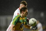 18 March 2017; Martin O'Reilly of Donegal  in action against Declan McClure of Tyrone during the Allianz Football League Division 1 Round 5 match between Donegal and Tyrone at MacCumhaill Park in Ballybofey, Co Donegal Photo by Oliver McVeigh/Sportsfile