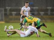 18 March 2017; Cathal McCarron of Tyrone in action against Jamie Brennan of Donegal during the Allianz Football League Division 1 Round 5 match between Donegal and Tyrone at MacCumhaill Park in Ballybofey, Co Donegal. Photo by Oliver McVeigh/Sportsfile