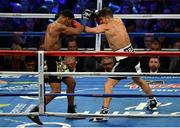 18 March 2017; Gennady Golovkin, left, in action against Daniel Jacobs during their middleweight title bout at Madison Square Garden in New York, USA. Photo by Ramsey Cardy/Sportsfile