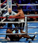 18 March 2017; Daniel Jacobs recovers from a knock down in the fourth round by Gennady Golovkin during their middleweight title bout at Madison Square Garden in New York, USA. Photo by Ramsey Cardy/Sportsfile