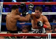 18 March 2017; Gennady Golovkin, right, in action against Daniel Jacobs during their middleweight title bout at Madison Square Garden in New York, USA. Photo by Ramsey Cardy/Sportsfile