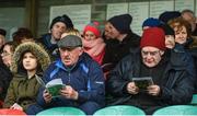 19 March 2017; Supporters study the program ahead of the Allianz Football League Division 1 Round 5 match between Monaghan and Roscommon at Pairc Grattan in Inniskeen, Co Monaghan. Photo by Philip Fitzpatrick/Sportsfile
