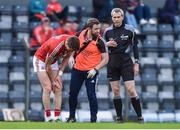19 March 2017; Aidan Walsh of Cork with team physo Brian O'Connell after he was injured during the Allianz Football League Division 2 Round 5 match between Cork and Meath at Páirc Uí Rinn in Cork. Photo by Matt Browne/Sportsfile
