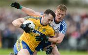 19 March 2017; Tom Featherson of Roscommon in action against Ryan McAnespie of Monaghan during the Allianz Football League Division 1 Round 5 match between Monaghan and Roscommon at Páirc Grattan in Inniskeen, Co Monaghan. Photo by Piaras Ó Mídheach/Sportsfile