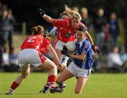 27 August 2011; Tracey Lawlor, Laois, in action against Ann Marie Walsh, left, and Brid Stack, Cork. TG4 All-Ireland Ladies Senior Football Championship Semi-Final, Cork v Laois, Leahy Park, Cashel, Co. Tipperary. Picture credit: Brian Lawless / SPORTSFILE