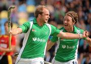 28 August 2011; Timothy Cockram, left, Ireland, celebrates with team-mate Andrew McConnell, after scoring his side's second goal. Ireland v Spain - GANT EuroHockey Nations Men's Championships 2011. Warsteiner HockeyPark, Mönchengladbach, Germany. Picture credit: Diarmuid Greene / SPORTSFILE
