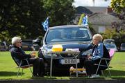 28 August 2011; Dublin supporters Marie and Val Dunne, from Walkinstown, relax in the grounds of Clonliffe College as they enjoy a picnic on their way to the GAA Football All-Ireland Championship Semi-Finals, Croke Park, Dublin. Picture credit: Ray McManus / SPORTSFILE