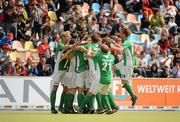 28 August 2011; Ireland players celebrate at the final whistle after victory over Spain. Ireland v Spain - GANT EuroHockey Nations Men's Championships 2011. Warsteiner HockeyPark, Mönchengladbach, Germany. Picture credit: Diarmuid Greene / SPORTSFILE