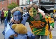 28 August 2011; Dublin supporter Anthony McGennis, aged 6, from Rathmines, and his cousin Conaill Burke, aged 10, from Frosses, Co. Donegal. Supporters at the GAA Football All-Ireland Championship Semi-Finals, Croke Park, Dublin. Picture credit: Dáire Brennan / SPORTSFILE