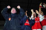 28 March 2002; St Patrick's Athletic coach Eamon Collins, left, celebrates with players, from left, Charles Mbabazi Livingstone, Ger McCarthy and Paul Osam celebrate after the eircom League Premier Division match between Dundalk and St Patrick's Athletic at Oriel Park in Dundalk, Louth. Photo by David Maher/Sportsfile