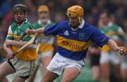 30 March 2002; Liam Cahill of Tipperary in action against John Paul O'Meara of Offaly during the Allianz National Hurling League Division 1B Round 1 match between Offaly and Tipperary in St Brendan's Park in Birr, Offaly. Photo by Brendan Moran/Sportsfile