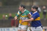 30 March 2002; Brian Whelahan of Offaly in action against Philip Maher of Tipperary during the Allianz National Hurling League Division 1B Round 1 match between Offaly and Tipperary in St Brendan's Park in Birr, Offaly. Photo by Brendan Moran/Sportsfile