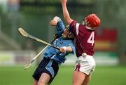 30 March 2002; Kevin Flynn of Dublin in action against Ollie Canning of Galway during the Allianz Hurling League Division 1A Round 1 match between Dublin and Galway at Parnell Park in Dublin. Photo by Damien Eagers/Sportsfile