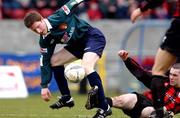 31 March 2002; Robbie Griffin of St Patrick's Athletic in action against Paul McNally of Longford Town during the eircom League Premier Division match between Longford Town and St Patrtick's Athletic at Flancare Park in Longford. Photo by David Maher/Sportsfile