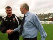 31 March 2002; Shelbourne manager Dermot Keely, right, and Bohemians manager Stephen Kenny shake hands after the eircom League Premier Division match between Bohemians and Shelbourne at Dalymount Park in Dublin. Photo by Ray Lohan/Sportsfile