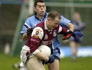 31 March 2002; John Donnellan of Galway in action against David Henry of Dublin during the Allianz Football League Division 1A Round 7 match between Galway and Dublin at St Jarlath's Park in Tuam, Galway. Photo by Damien Eagers/Sportsfile