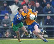 31 March 2002; Jonathan Dunning of Roscommon in action against Damien Diver of Donegal during the Allianz Football League Division 1A Round 7 match between Roscommon and Donegal at Dr Hyde Park in Roscommon. Please note Donegal wore the Roscommon  away strip due to a clash of jerseys. Photo by Ray McManus/Sportsfile