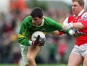 31 March 2002; Aodán Mac Gearailt of Kerry in action against Aaron Hoey of Louth during the Allianz National Football League Division 2A Round 7 match between Louth and Kerry at Páirc Mhuire in Ardee in Louth. Photo by Aoife Rice/Sportsfile