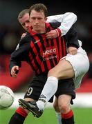 31 March 2002; Trevor Croly of Bohemians in action against Jonathan Minnock of Shelbourne during the eircom League Premier Division match between Bohemians and Shelbourne at Dalymount Park in Dublin. Photo by Ray Lohan/Sportsfile
