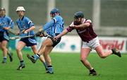 30 March 2002; Ciarán Wilson of Dublin in action against Liam Hodgins of Galway during the Allianz Hurling League Division 1A Round 1 match between Dublin and Galway at Parnell Park in Dublin. Photo by Damien Eagers/Sportsfile