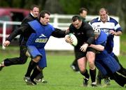 28 February 2002; Rob Henderson is tackled by John Kelly and Keith Gleeson, left, during Ireland Rugby Squad Training at Dr Hickey Park in Greystones, Wicklow. Photo by Matt Browne/Sportsfile