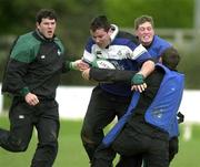28 February 2002; Anthony Foley is tackled by Guy Easterby and Ronan O'Gara, behind, during Ireland Rugby Squad Training at Dr Hickey Park in Greystones, Wicklow. Photo by Matt Browne/Sportsfile