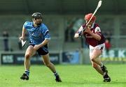 30 March 2002; Shane Martin of Dublin in action against Ollie Canning of Galway during the Allianz Hurling League Division 1A Round 1 match between Dublin and Galway at Parnell Park in Dublin. Photo by Pat Murphy/Sportsfile