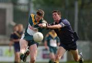 3 April 2002; Colm Kelly of Ireland in action against Daniel Bell of Australia during the U17 International Rules Second Test match between Ireland and Australia at Parnell Park in Dublin. Photo by Aoife Rice/Sportsfile
