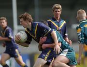 3 April 2002; Brendan Goddard of Australia is tackled by Colm Kelly of Ireland during the U17 International Rules Second Test match between Ireland and Australia at Parnell Park in Dublin. Photo by Aoife Rice/Sportsfile