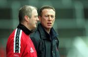 31 March 2002; Eugene McKenna, Tyrone manager, right, and Cork manager Larry Tompkins during the Allianz Football League Division 1A Round 7 match between Cork and Tyrone at Páirc Uí Chaoimh in Cork. Photo by Brendan Moran/Sportsfile
