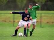 4 April 2002; John Johnston of Scotland is tackled by Alan Kearney of Republic of Ireland during the Schoolboy U15 Presentative Match match between Republic of Ireland and Scotland at the AUL Complex in Clonshaugh, Dublin. Photo by Damien Eagers/Sportsfile