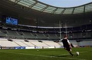 5 April 2002; David Humphreys practices his goal kicking during the Ireland Rugby Captain's Run at the Stade de France in Paris, France. Photo by Brendan Moran/Sportsfile