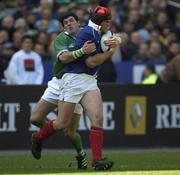 6 April 2002; Fabien Pelous of France is tackled by Shane Horgan of Ireland during the Six Nations Rugby Championship match between France and Ireland at Stade de France in Paris, France. Photo by Brendan Moran/Sportsfile