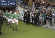 6 April 2002; Peter Clohessy leads the Ireland team to the pitch prior to the Six Nations Rugby Championship match between France and Ireland at Stade de France in Paris, France. Photo by Brendan Moran/Sportsfile