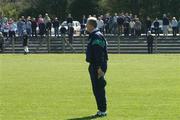 7 April 2002; Limerick manager Eamonn Cregan stands during the playing of the National Anthem prior to the Allianz National Hurling League Division 1B Round 5 match between Derry and Limerick at Erin's Owen GAA in Lavey, Derry. Photo by Ray McManus/Sportsfile