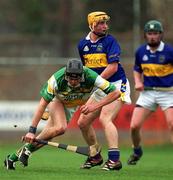30 March 2002; Rory Hanniffy of Offaly in action against Eamonn Corcoran of Tipperary during the Allianz National Hurling League Division 1B Round 1 match between Offaly and Tipperary in St Brendan's Park in Birr, Offaly. Photo by Brendan Moran/Sportsfile