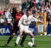 7 April 2002; Gary Haylock of Dundalk in action against Stephen Caffrey of Bohemians during the FAI Carlsberg Senior Challenge Cup Final match between Bohemians and Dundalk at Tolka Park in Dublin. Photo by David Maher/Sportsfile