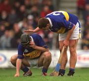 30 March 2002; John Carroll of Tipperary, right, checks on team-mate Eoin Kelly during the Allianz National Hurling League Division 1B Round 1 match between Offaly and Tipperary in St Brendan's Park in Birr, Offaly. Photo by Brendan Moran/Sportsfile