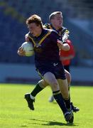 7 April 2002; Brendon Goddard of Australia is tackled by Dermot McGlade of Ireland during the U17 International Rules Third Test match between Ireland and Australia at Páirc Uí Chaomh in Cork. Photo by Damien Eagers/Sportsfile