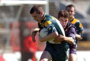 7 April 2002; Barry McGoldrick of Ireland is tackled by Ben Mitchell of Australia during the U17 International Rules Third Test match between Ireland and Australia at Páirc Uí Chaomh in Cork. Photo by Damien Eagers/Sportsfile