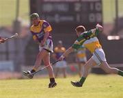 7 April 2002; Barry Lambert of Wexford in action against Barry Whelahan of Offaly during the Allianz National Hurling League Division 1B Round 5 match between Offaly and Wexford at St Brendan's Park in Birr, Offaly. Photo by Aoife Rice/Sportsfile