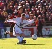 7 April 2002; Ciaran Kavanagh of Dundalk in action against Kevin Hunt of Bohemians during the FAI Carlsberg Senior Challenge Cup Final match between Bohemians and Dundalk at Tolka Park in Dublin. Photo by Brian Lawless/Sportsfile