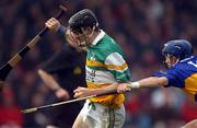 30 March 2002; Rory Hannify of Offaly in action against Mark O'Leary of Tipperary  during the Allianz National Hurling League Division 1B Round 1 match between Offaly and Tipperary in St Brendan's Park in Birr, Offaly. Photo by Brendan Moran/Sportsfile
