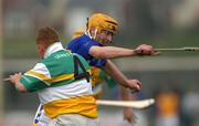 30 March 2002; Liam Cahill of Tipperary in action against Seamus Tooher of Offaly during the Allianz National Hurling League Division 1B Round 1 match between Offaly and Tipperary in St Brendan's Park in Birr, Offaly. Photo by Brendan Moran/Sportsfile