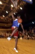 24 March 2002; Neptune's Kenny Gamble on his way to winning the National Slam Dunk competition at the ESB Men's National Championships Final match between Frosties Tigers Tralee and Dart Killester in the National Exhibition Centre in Killarney, Kerry. Photo by Brendan Moran/Sportsfile