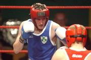 22 February 2002; David Conlon of Crumlin Boxing Club, Dublin, left, during the Welterweight Final against James Moore of Arklow, Wicklow, during the National Senior Boxing Championships 2002 at The National Stadium in Dublin. Photo by Damien Eagers/Sportsfile