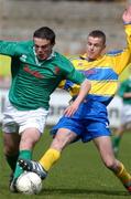 10 April 2002; Chris Cannon of PCC Falcarragh is tackled by James Cummins of Nagle Community College during the Smart Telecom Dr Tony O'Neill Irish Senior Cup Final match between PCC Falcarragh and Nagle Community College at Belfield in Dublin. Photo by Matt Browne/Sportsfile